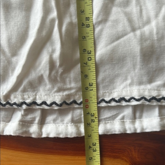 Embroidered Sleeveless White Dress - Picture 8 of 9